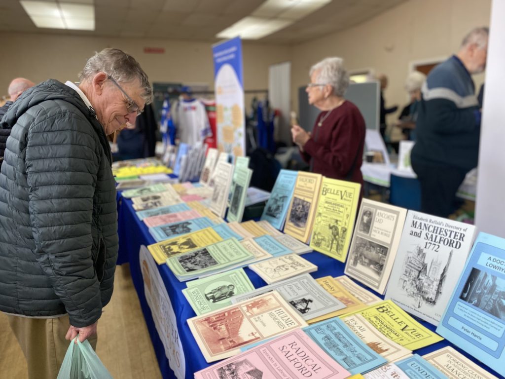 A man looking at leaflets