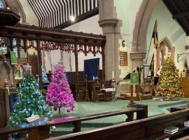 Inside St Paul's Church Walkden during the Christmas Tree Festival, image belongs to Barbara Barratt.