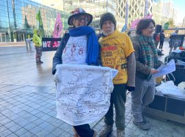 Two of the climate protestors outside the BBC