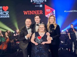 Hannah Payton receving her award with Gemma Atkinson