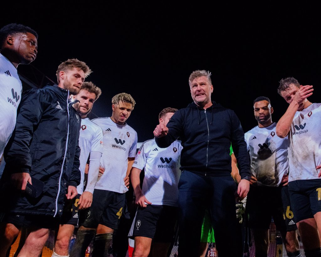 Karl Robinson giving a post-match team talk to his Salford City players. Image Credit: Salford City FC.
