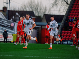 Callum Hendry celebrating his winner as Salford City drew away to Swindon Town. Image Credit: Salford City FC.