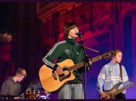 John Denton lead vocalist for The Heights performing a song