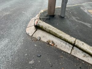 The road is crumbling in sections