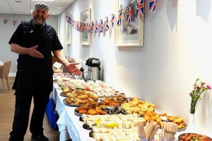 Head chef Maciej Matyla with some of the 1940s style foods served at the Broughton House VE Day garden party