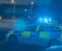 Police cordon off Salford street after a man in his 50s was found with stab injuries