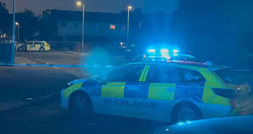 Police cordon off Salford street after a man in his 50s was found with stab injuries