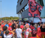 Salford Red Devils supporters march in protest with hundreds in attendance