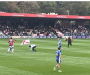 Three men charged after pitch invasion at Salford City in alleged Gary Neville protest