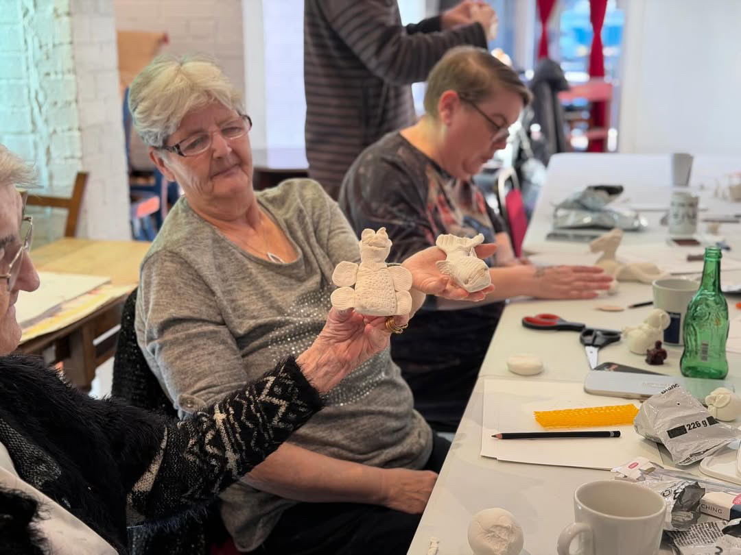 Crafters creating 'Together in the Making' project at Salford Arts Theatre