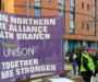 Salford Royal Hospital critical care staff strike in dispute over overtime pay