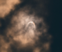 How can I watch the partial solar eclipse safely in Salford?